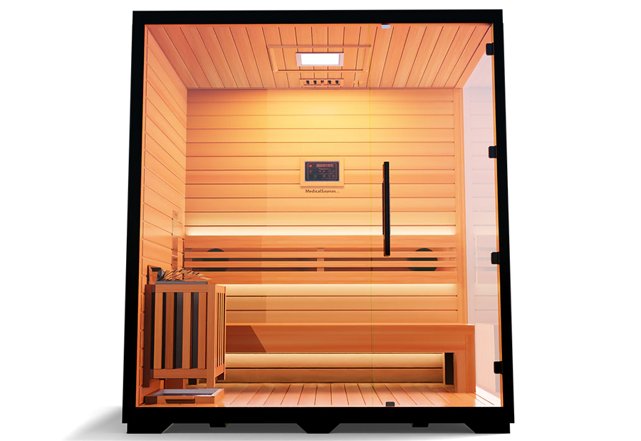 Experience the Medical Saunas - Traditional 7, a 3-4 person Canadian Hemlock sauna by Medical Saunas, featuring a glass front door, wooden bench seating, left-side heater, soft warm lighting, and rapid internal heating for ultimate relaxation.