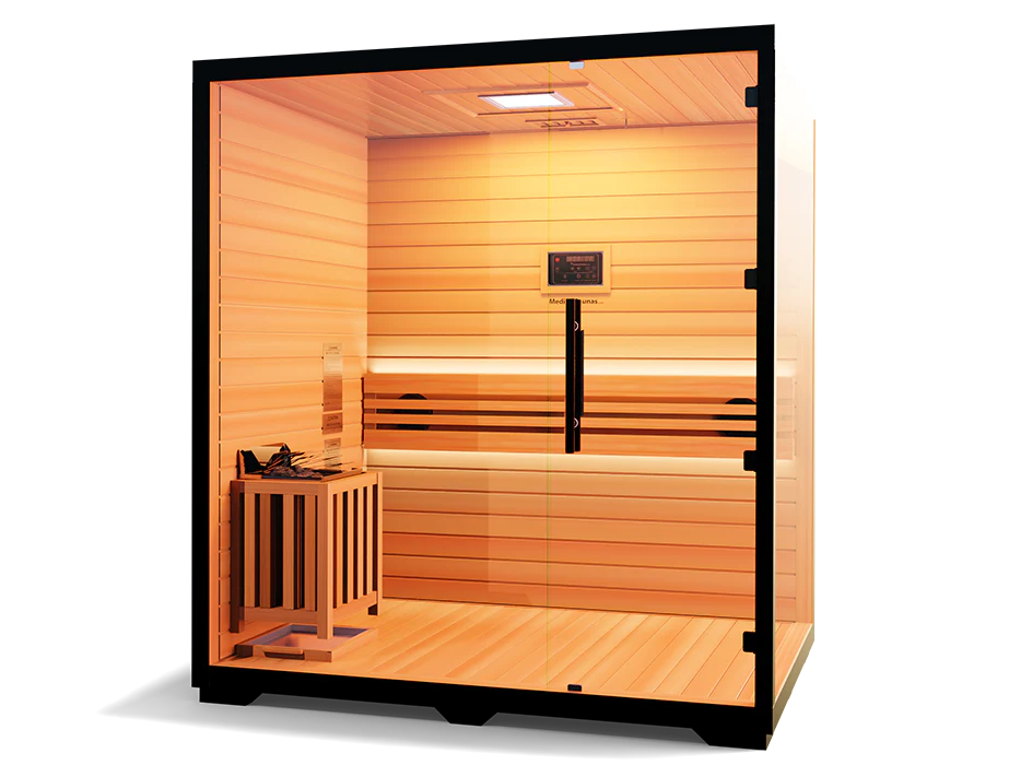 The Medical Saunas - Traditional 7 by Medical Saunas is a modern Canadian Hemlock 3-4 person sauna with glass walls and door, interior bench, digital control panel, corner heater, Rapid Internal Heating System, and warm ambient lighting for relaxation.