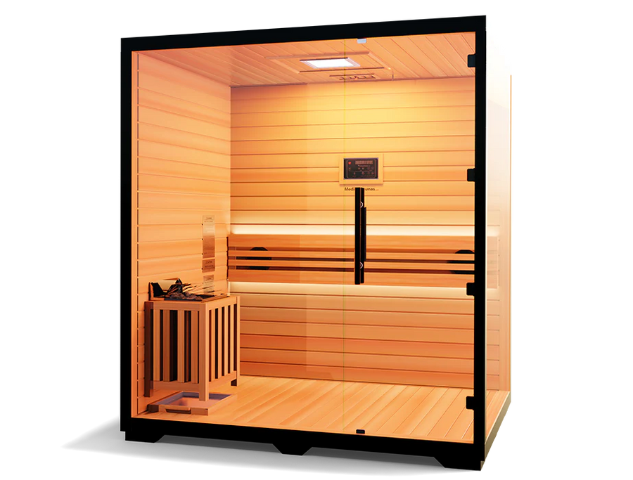 The Medical Saunas - Traditional 7 by Medical Saunas is a modern Canadian Hemlock 3-4 person sauna with glass walls and door, interior bench, digital control panel, corner heater, Rapid Internal Heating System, and warm ambient lighting for relaxation.
