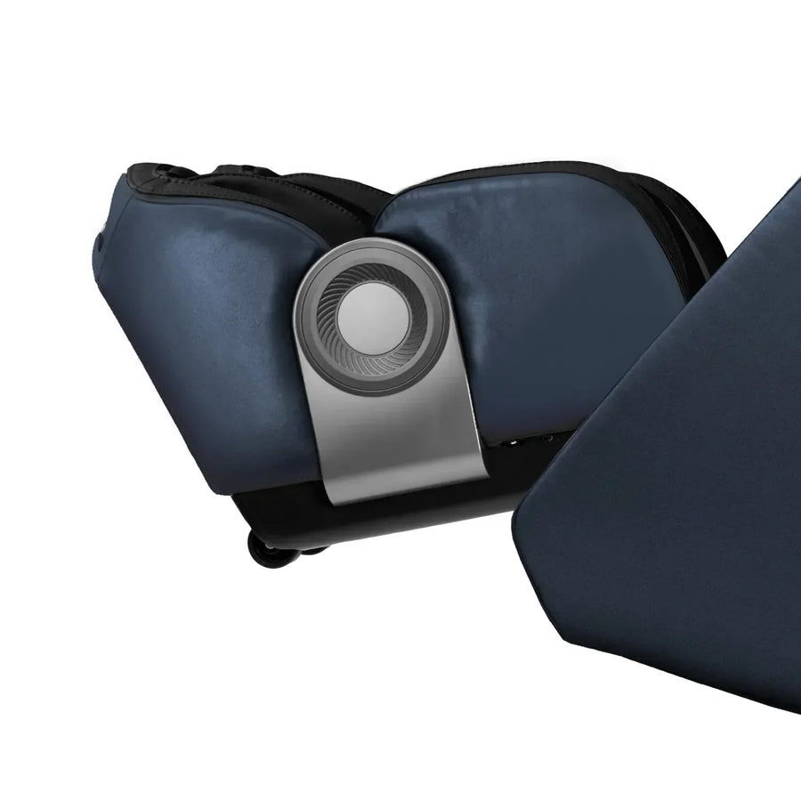 Close-up of the Osaki 4D+3D Bravo Duo Flex massage chair’s dark blue foot and calf rest with silver control knob, highlighting cushioning and part of the reclined seat against a white background.