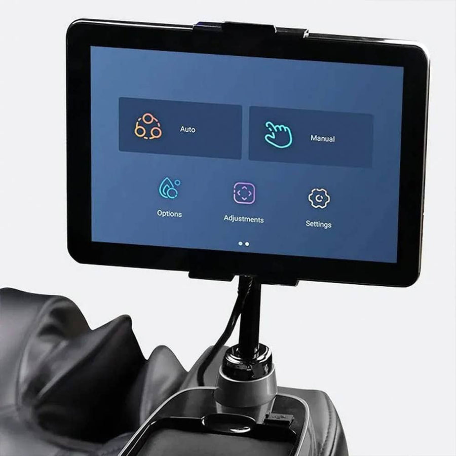The Daiwa Pegasus Hybrid Massage Chair features a tablet on a stand displaying Auto, Manual, Options, Adjustments, and Settings for full-body relaxation with advanced 3D massage rollers and a sleek black armrest.