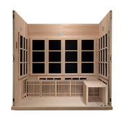 Golden Designs Catalonia 8 Person Ultra Low EMF FAR Infrared Sauna in a wooden room with windows and bench, showcasing its spacious, wheelchair-accessible design and high-quality Canadian Hemlock construction.