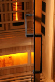 Close-up of the Golden Designs Reserve Edition GDI-8030-03 Full Spectrum Sauna door handle in a sauna setting.
