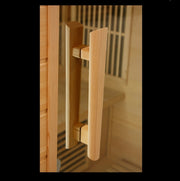 Maxxus 2 Person Low EMF FAR Infrared Sauna in Canadian Hemlock with wooden door handle, glass door, and chromotherapy lighting.