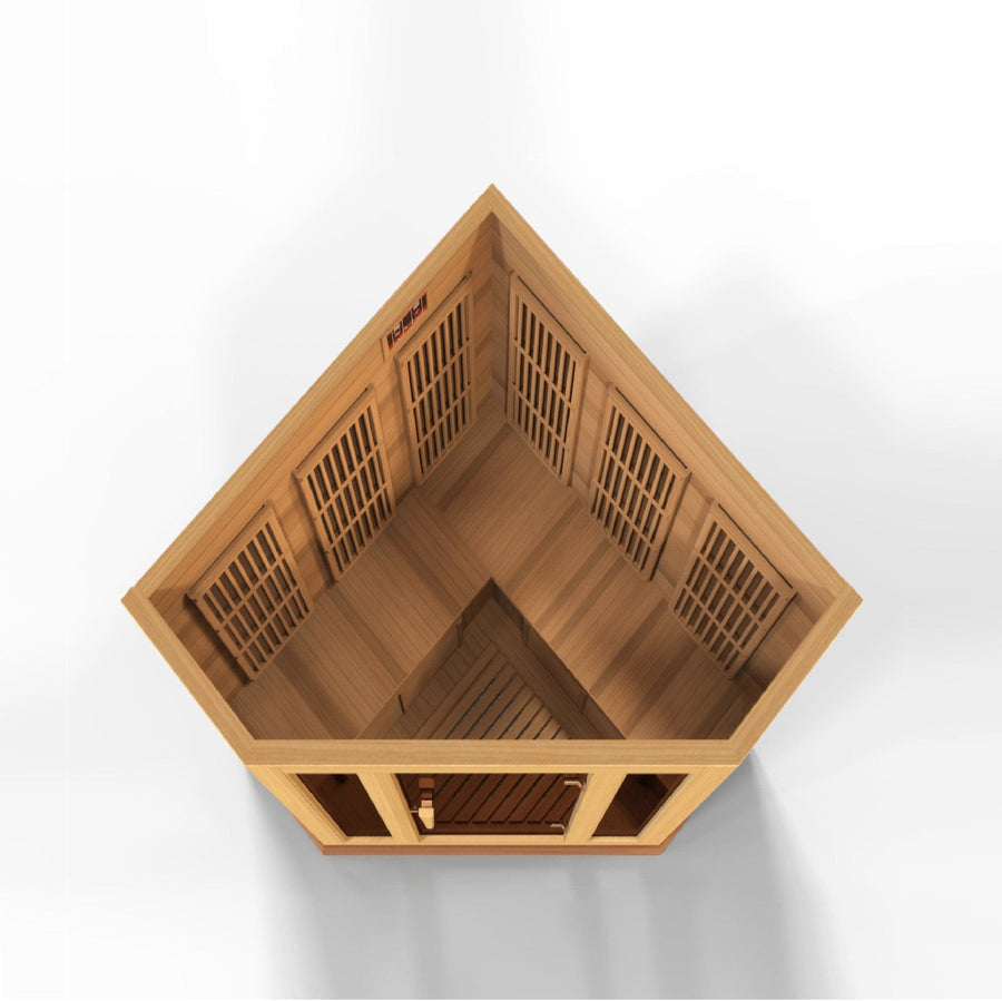 Maxxus 3 Person Low EMF FAR Corner Infrared Sauna made of Canadian Red Cedar with tempered glass door and vents visible.