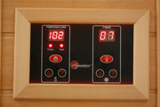 Close-up of Maxxus 3 Person Low EMF FAR Corner Infrared Sauna Canadian Red Cedar with touch screen control panel and digital clock display.