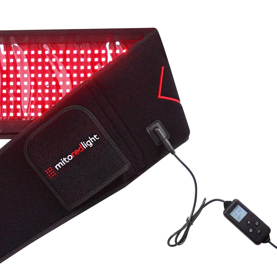 The MitoQUAD™ Wavelength Belt by Mito Red Light is a black, medical-grade red light therapy belt with glowing red LEDs, a wired control unit featuring a digital screen, and a velcro patch for secure hands-free use.