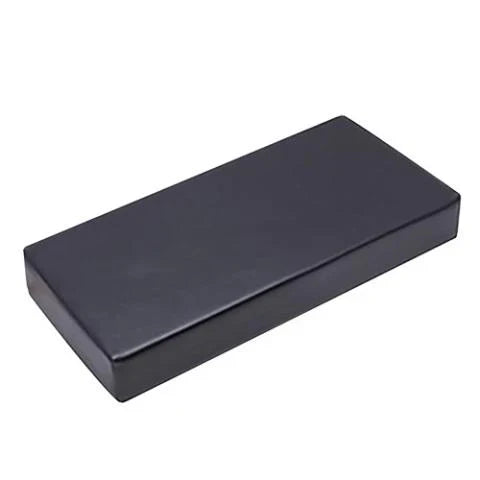 A rectangular black Finnmark Sauna Cushion for FD-1, made with marine grade vinyl, is shown on a white background—non-toxic and perfect as a sauna accessory.