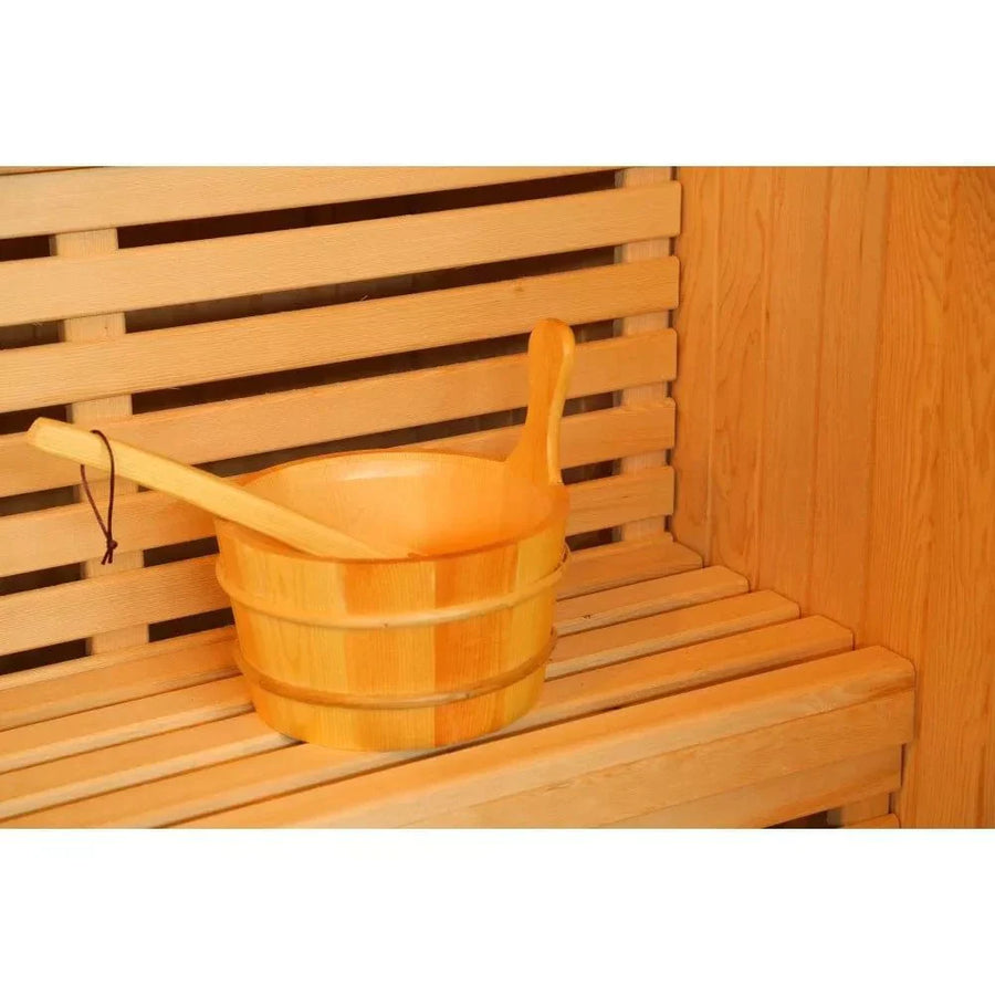 Sunray Southport 3 Person Traditional Sauna 300SN, featuring a wooden bucket and spoon on a bench, ideal for adding water to the sauna stones.