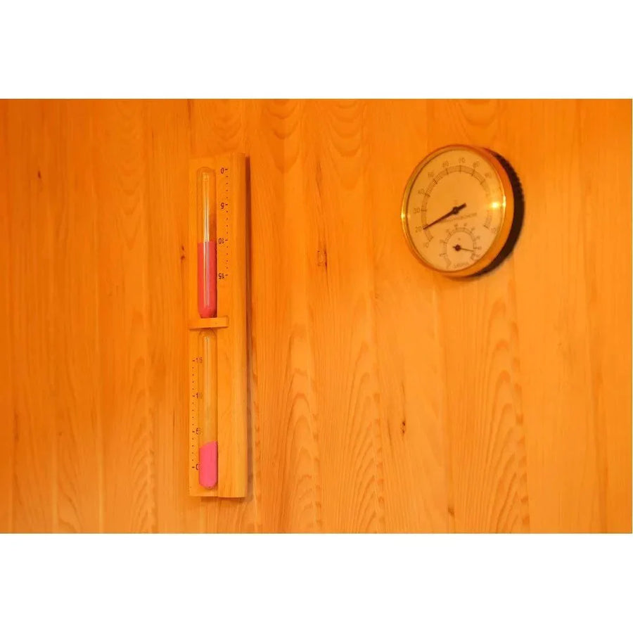 Sunray Southport 3 Person Traditional Sauna with wall-mounted thermometer, displaying indoor temperature and humidity levels.