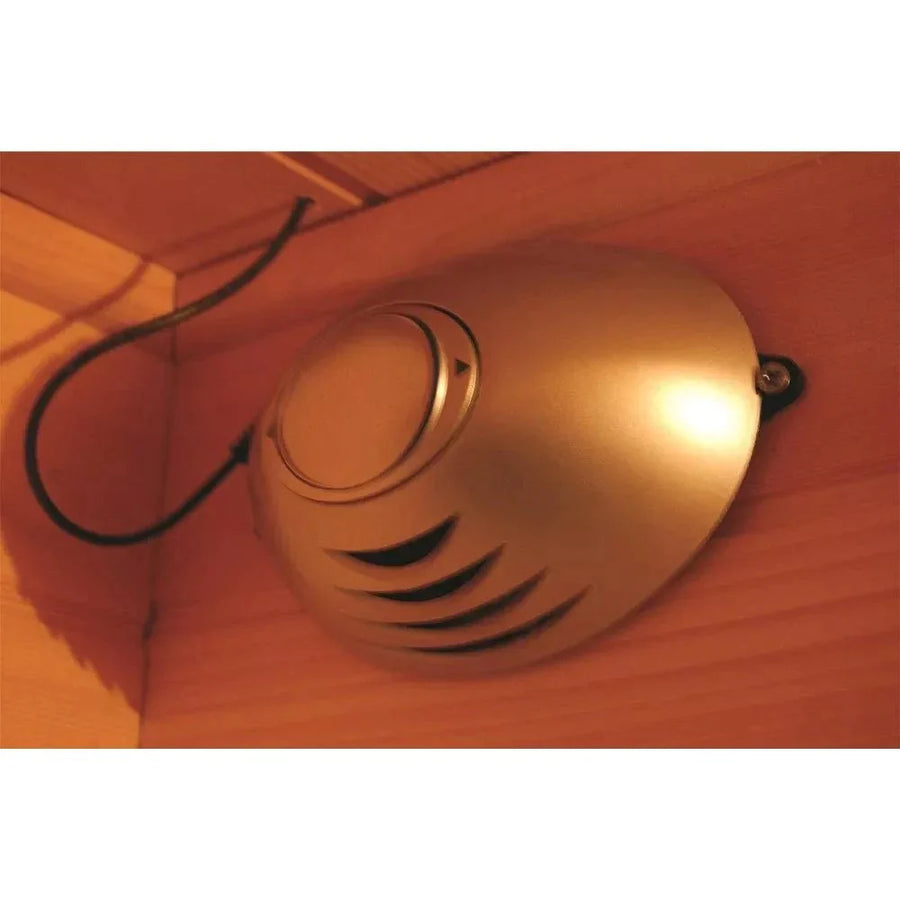 SunRay Bristol Bay 4-Person Indoor Corner Sauna 400KC with black cord and ergonomic backrest, featuring carbon heaters and recessed lighting for optimal comfort.