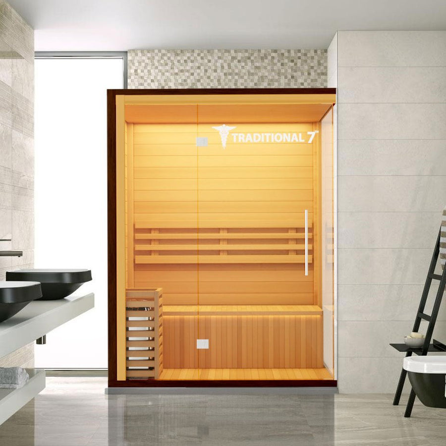 Traditional 7 Medical Sauna (3 Person) in a bathroom, featuring a wooden build with a glass door and spacious internal benches.