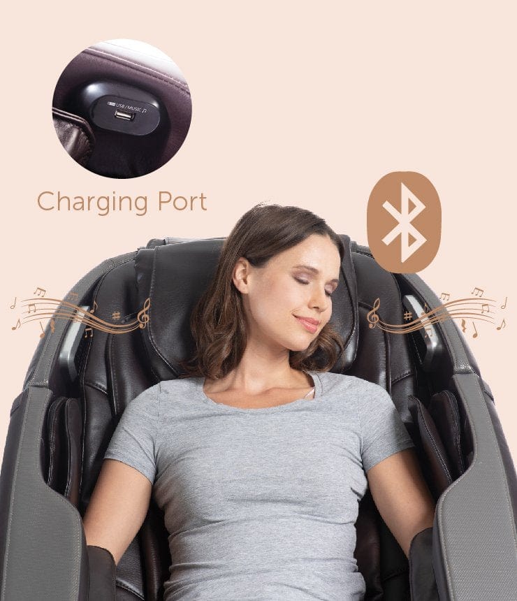 A woman sleeping in a Daiwa Orbit 3D Massage Chair, featuring a USB port and advanced full-body massage capabilities.