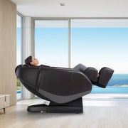 A woman relaxing in a Daiwa Orbit 3D Massage Chair, featuring advanced massage technology and zero-gravity positioning.