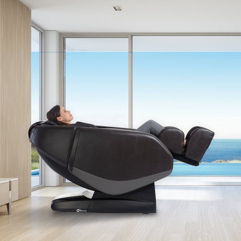 A woman relaxing in a Daiwa Orbit 3D Massage Chair, featuring advanced massage technology and zero-gravity positioning.