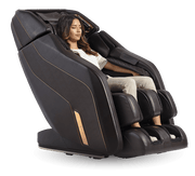 A woman sits in the Daiwa Pegasus 2 Smart Massage Chair, enjoying its advanced features like Zero Gravity and Shiatsu Wave™ Calf Massage.