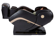A woman relaxing in the Kyota Kokoro M888 Massage Chair, showcasing its advanced features and luxurious design.