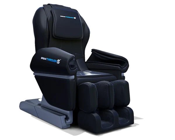The Medical Breakthrough 5 Massage Chair by Medical Breakthrough features padded armrests and footrests, a sleek black design with “Breakthrough S” on the panels, and offers full-body relaxation in a fully reclined Zero Gravity Sleep System.