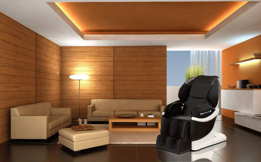 Medical Breakthrough 9 massage chair in a modern living room, adjacent to a coffee table and couch.